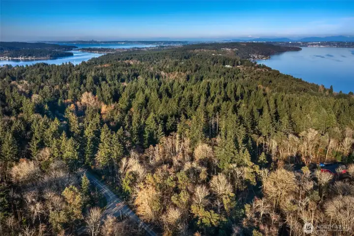 Looking northeast to the main shipping lanes. Point Robinson light house is on the point jutting east in the distance. Portage, the land bridge from Maury Island to Vashon, is in the distance on the left.