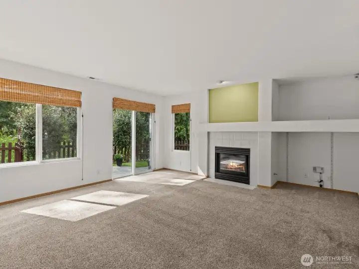 Downstairs, the rec room leads out to the back patio.