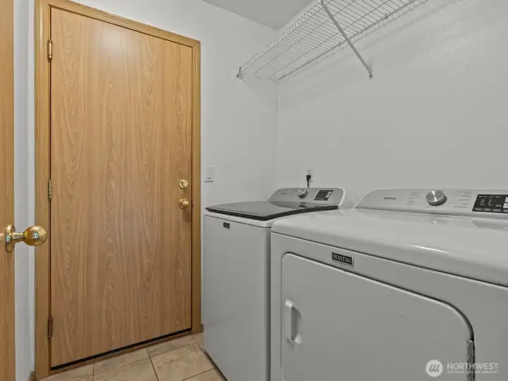 The laundry room leads you out to the oversized 3 car garage.