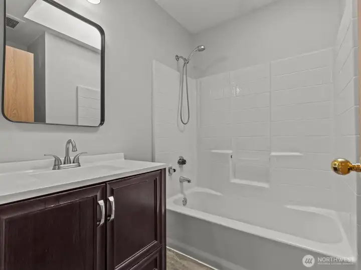 Upstairs, straight ahead you'll notice the full bathroom.