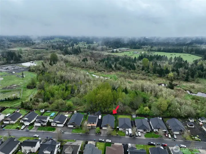 Drone view showing the area behind the home. Our understanding is that this is protected land.