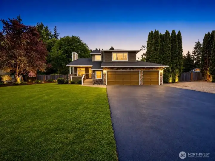 Front of home with ample parking and RV parking