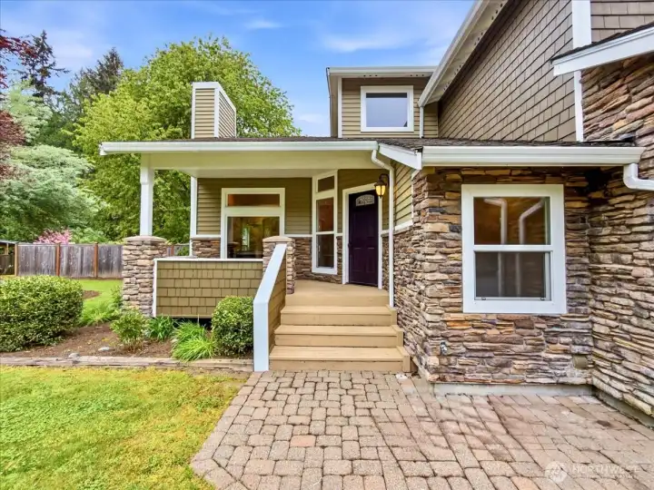 Entrance with spacious covered patio.
