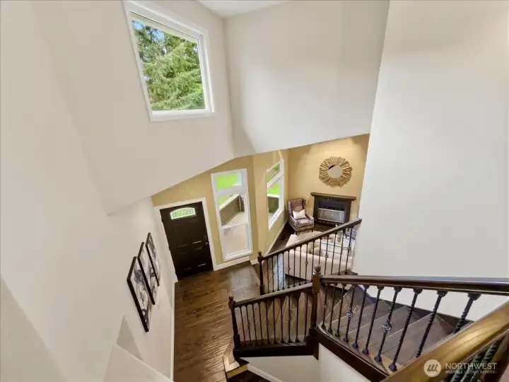 View from the upper-level bedroom wing where you will find a large 2nd bedroom and your primary bedroom.