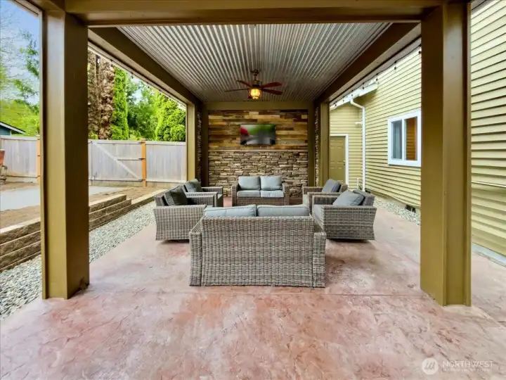 Covered outdoor entertainment area.