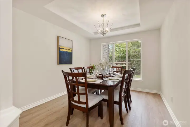Formal dining room opened to the great room