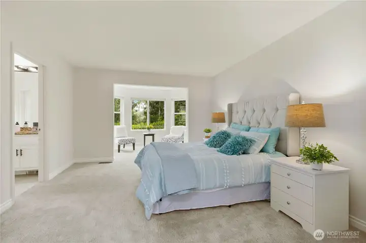 Large primary bedroom with separate sitting area