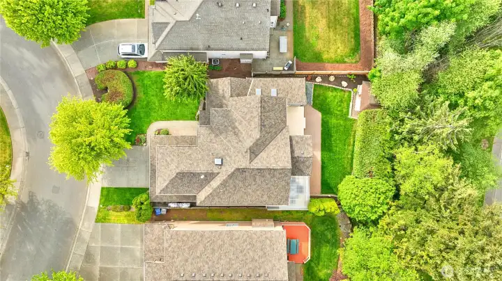 Aerial view showing the home with the preserved area on the back