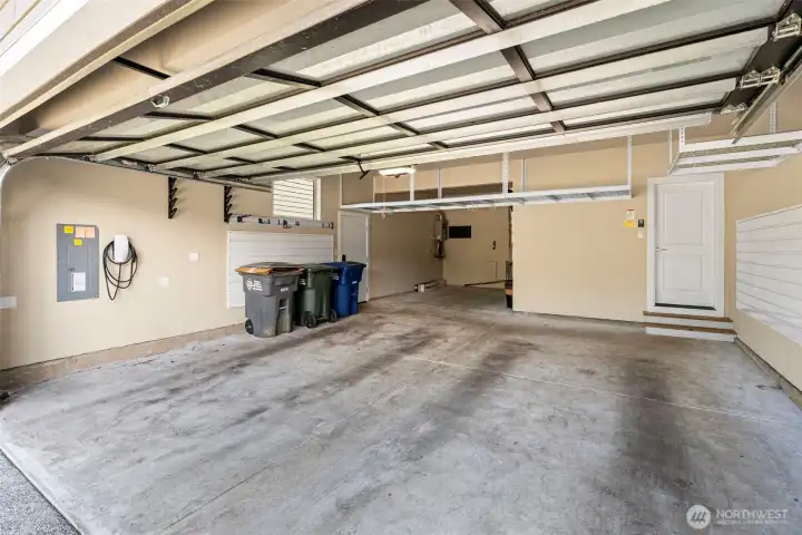 Garage with plenty of storage racks and Electric Car Charger