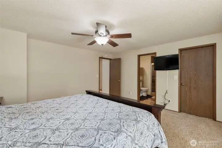 Walk in closet for all your clothing storage located in the primary bedroom. Walk in closet for all your clothing storage located in the primary bedroom.