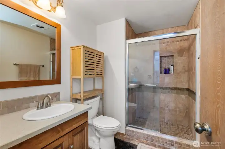 Primary bathroom with nice tile shower. Primary bathroom with nice tile shower.