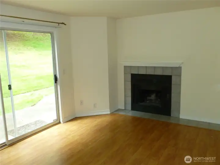 living room with wood burning fireplace living room with wood burning fireplace