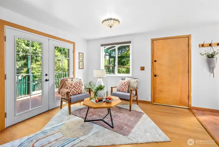 Natural light filled living room with french doors