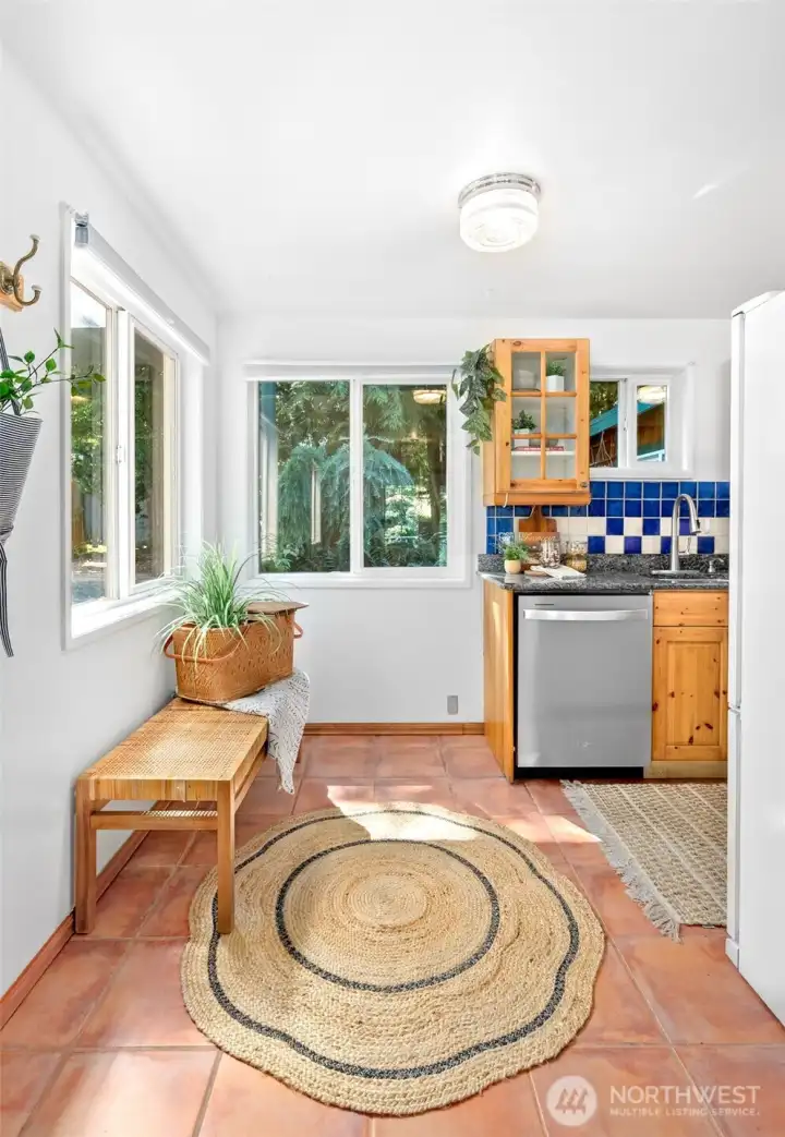 Warm cottage kitchen with lots of windows