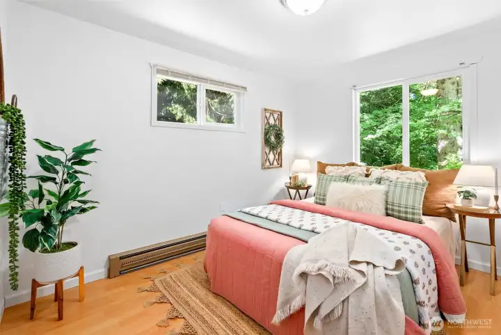 Bedroom with a closet and hardwood floors