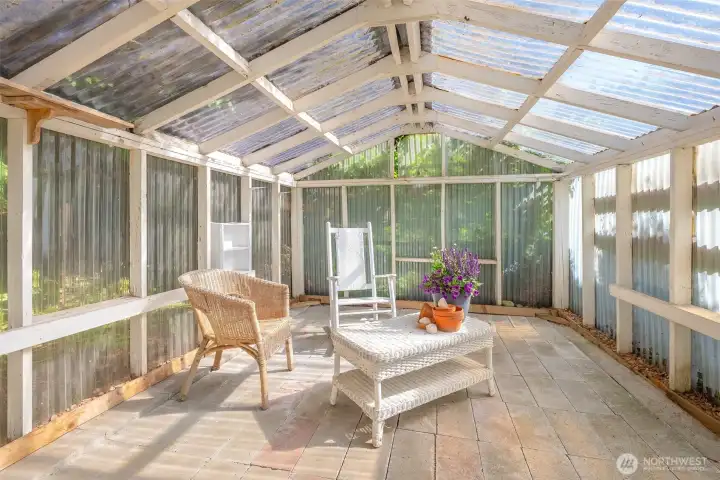 A greenhouse with power and irrigation to it for gardening or spending time