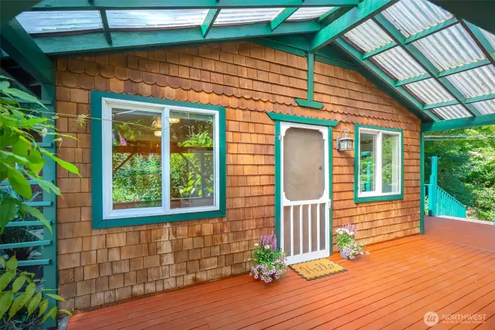 Cedar shake siding and a covered deck