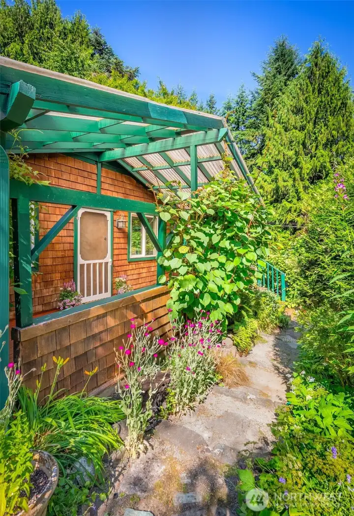 Unique stone paths take you from the home to different parts of the yard