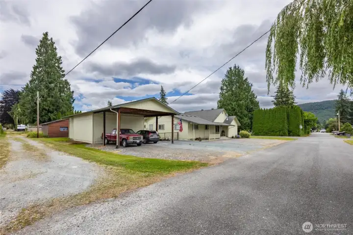 Detached shop, carport, side of house