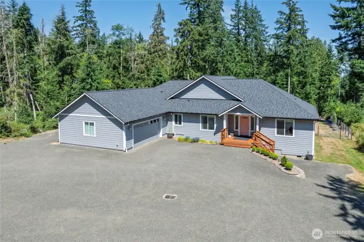 A 2019 immaculately maintained rambler on 2.46 acres. Newly installed 50-year architectural roof with new gutters. Cement fiber lap siding wraps this home with durability. Exterior was completely painted this year ensuring maintenance free living and peace of mind for years to come. Your very own groomed trail starts at the driveway and winds through the woods to a gate accessing the backyard...6 loops equal one mile. An abundance of parking and many more surprises await you! A 2019 immaculately maintained rambler on 2.46 acres. Newly installed 50-year architectural roof with new gutters. Cement fiber lap siding wraps this home with durability. Exterior was completely painted this year ensuring maintenance free living and peace of mind for years to come. Your very own groomed trail starts at the driveway and winds through the woods to a gate accessing the backyard...6 loops equal one mile. An abundance of parking and many more surprises await you!