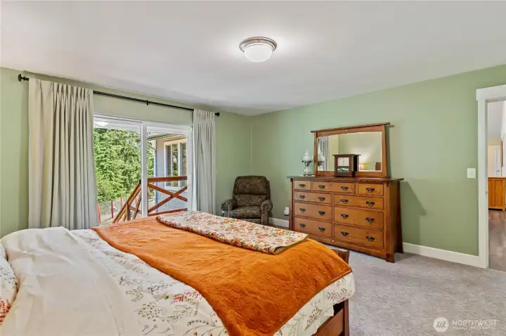 Another view of the Primary suite with new carpet. Veranda stained this year. Another view of the Primary suite with new carpet. Veranda stained this year.