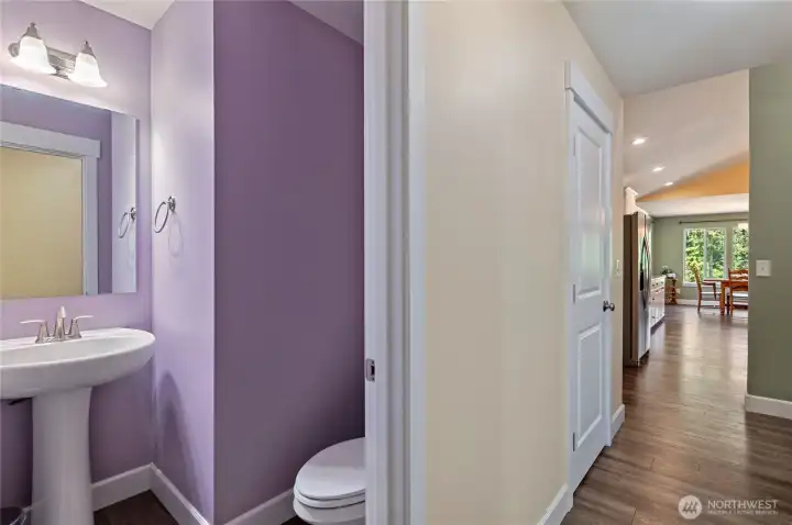 Guest bath located across from laundry room at end of hallway prior to garage access. Convenient location for cleaning up prior to entering main living space. Guest bath located across from laundry room at end of hallway prior to garage access. Convenient location for cleaning up prior to entering main living space.