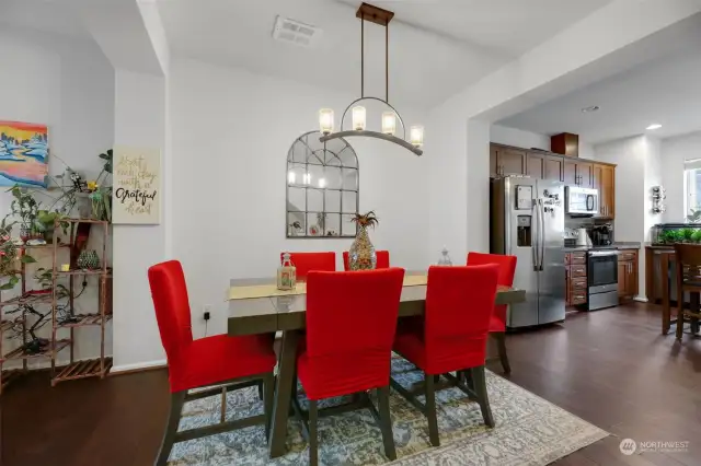 The entryway landing opens to the spacious dining room.