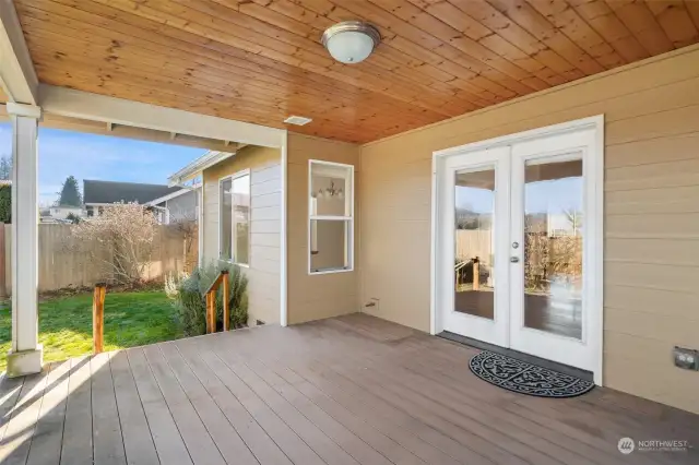 Back deck off living room and primary bedroom for easy entertaining - leading to level back yard - fenced!