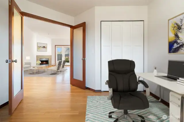 Double Door Office or Extra Bedroom right off the entry with hardwoods - Virtually Staged to give you a sense of the rooms potential.