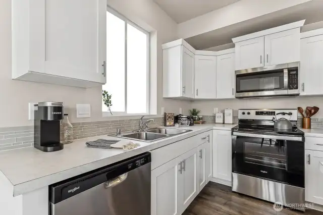 Photo is of a similar home. Colors and materials may vary.
