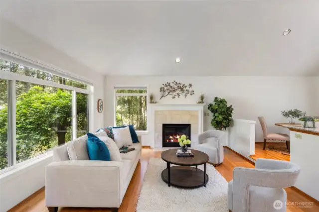 Main living room (family room #2) with natural gas fireplace.