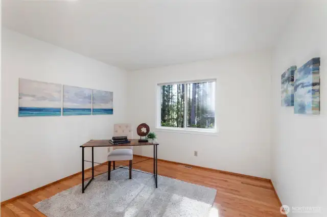 Bedroom #3 of 3. Nice size with view of backyard.