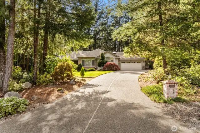Long driveway can accomodate your vehicles, RV or boat. Driveway is not too steep.