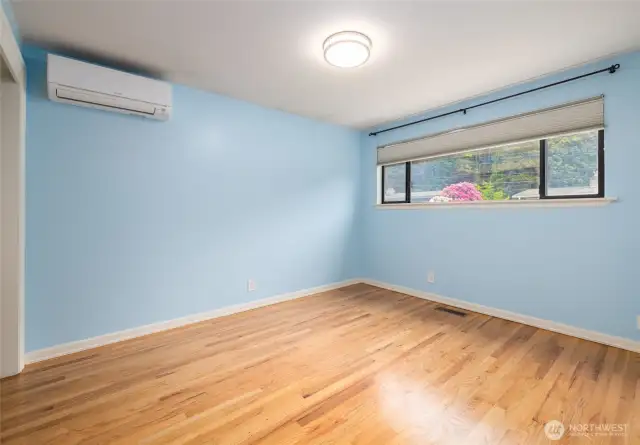 1 of 3 bedrooms on the main floor. New Mini Splits through out, with a/c. Real Oak Floors here too.