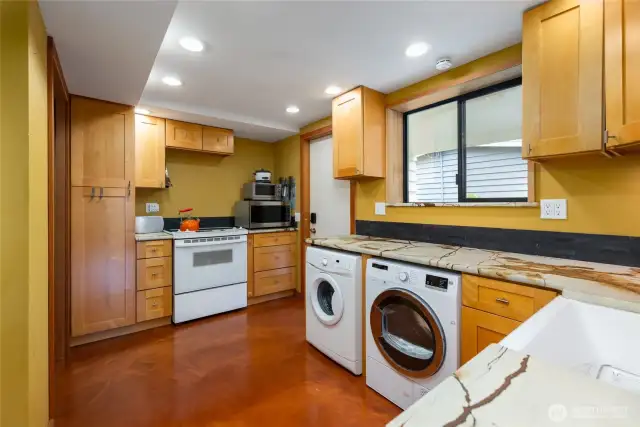 Another view of the downstairs full kitchen. There is pantry area around the corner.