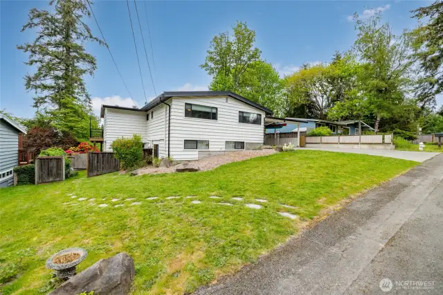 Location, Location, Location with Many Options for Use ! 3 FULL separate living units here, with separate entrances. 4 car garage and carport too. No HOA, Northshore schools.