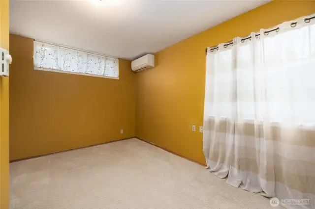 One of two bedrooms on the downstairs level. New Mini Splits throughout the house.