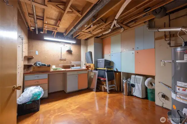 Downstairs shop and storage area. Epoxy floors here also !
