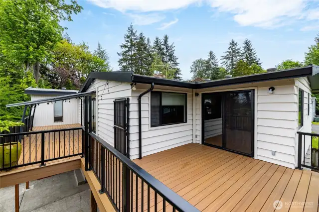 Amazing composite decks... These are really large spaces for all kinds of entertaining. Note the gate ~ you can keep pets contained in an area while you entertain !