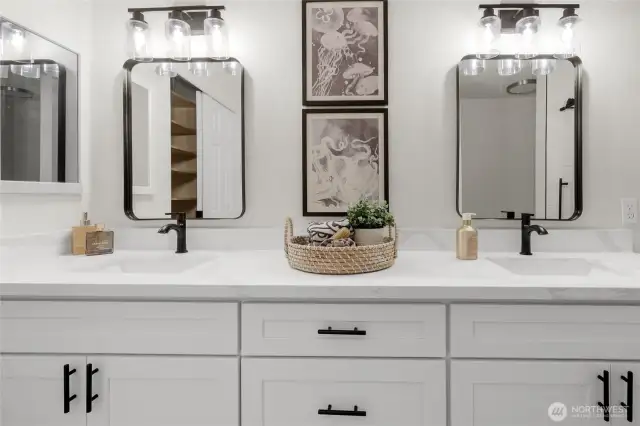 The primary bath is large and has a beautiful fresh vibe