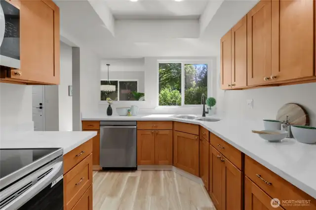 New appliances, and new counters in the super bright and cheery kitchen