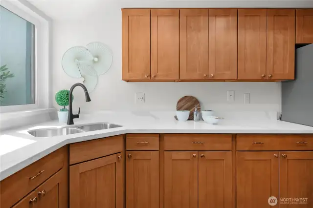 New appliances, and new counters in the super bright and cheery kitchen