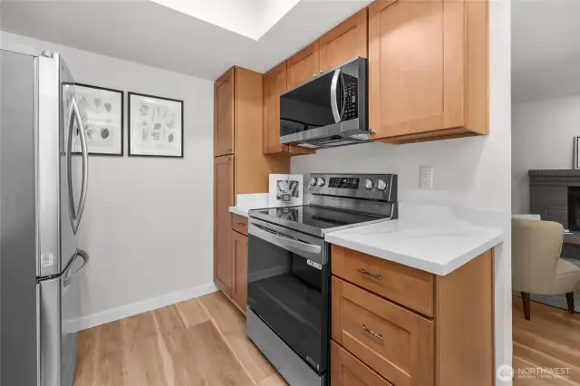 New appliances, and new counters in the super bright and cheery kitchen