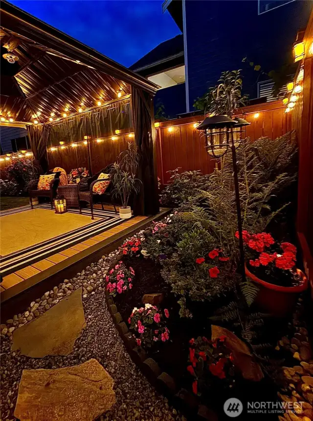 Gazebo has option to be enclosed with screen or curtains, separate track for both.