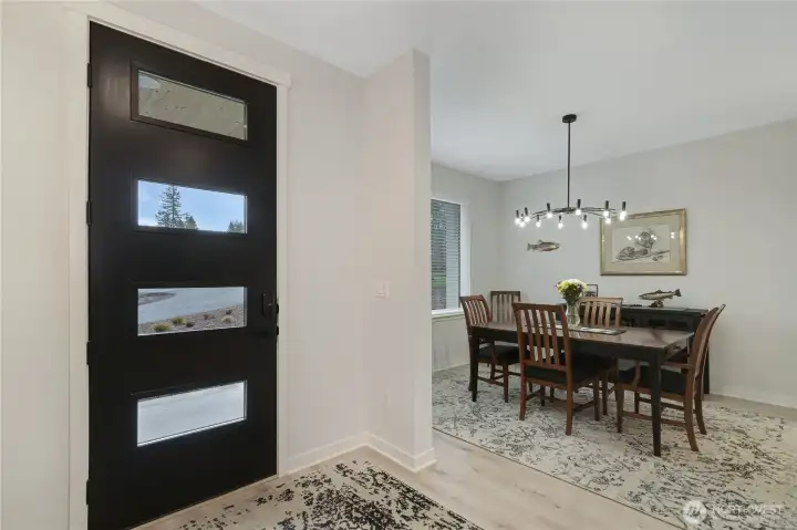 Open entry/foyer and formal dining room