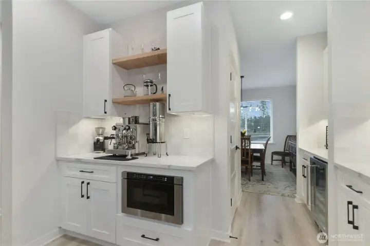 Beautifully designed dry bar with microwave and great storage