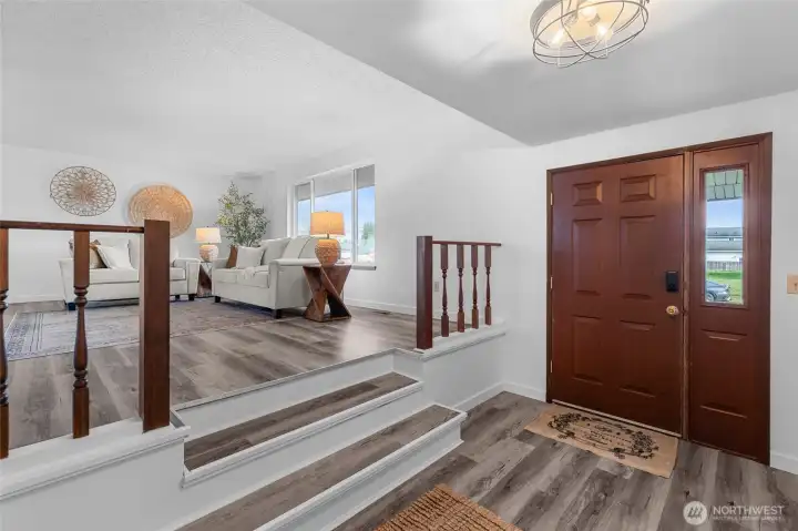 ENTRY | Just off the entry you'll see the elevated living room to your right.