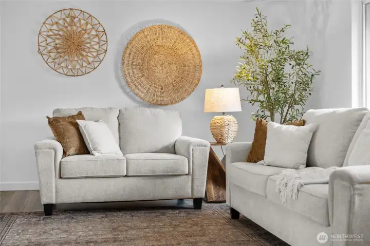 LIVING ROOM | The full-size couch and loveseat are almost dwarfed by the size of this living room. There's more than enough room for all your decor.