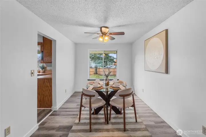 DINING ROOM | This gracious space looks out onto the backyard and has plenty of room for a big dining table.