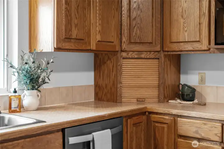 KITCHEN | The appliance storage cabinet. What a handy spot to store that crockpot you use all the time, but don't necessarily want to look at.